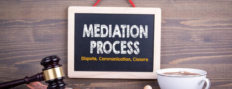MediationProcessConceptDisputeCommunicationClosureChalkboardOnAWooden